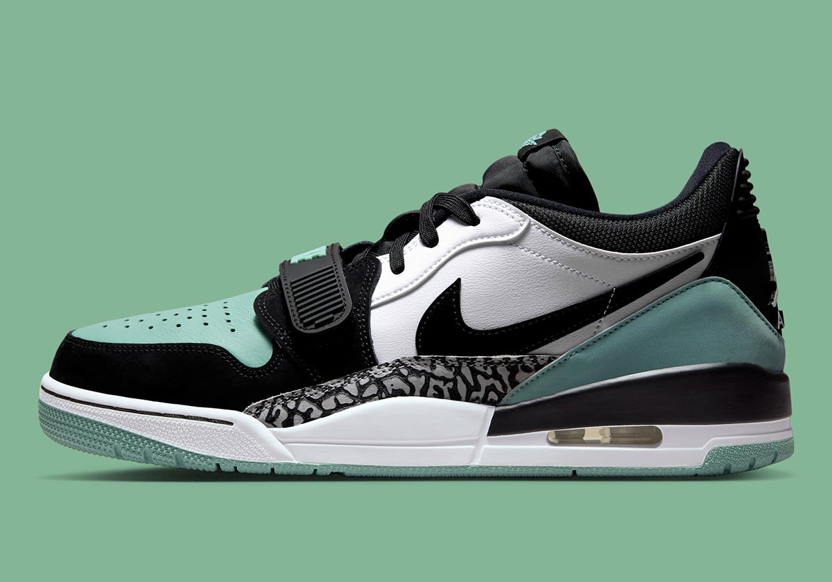 El verde pastel se posa sobre las Jordan Legacy 312 Low.